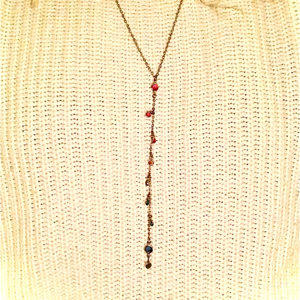 Gold Y shaped necklace with rainbow colored stones